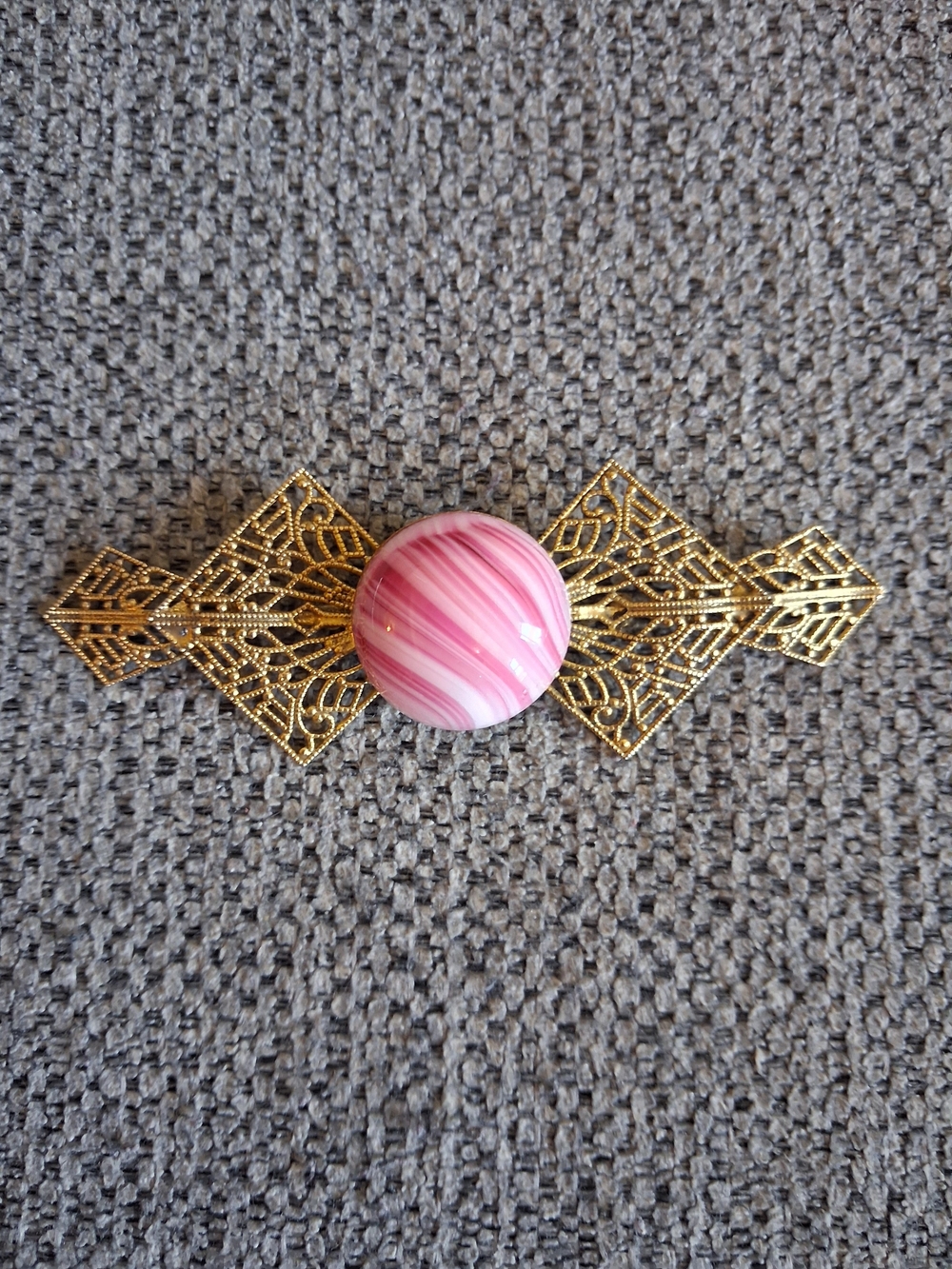 Vintage Gold Tone Filigree Brooch with Pink Swirl Glass Cabochon